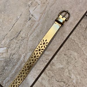 Gold cutout belt.